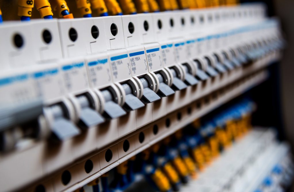 Close-up view of electrical switchboard showing circuit breakers and wiring, highlighting the importance of electrical switchboard upgrades, installations, repairs, and replacements in Melbourne.