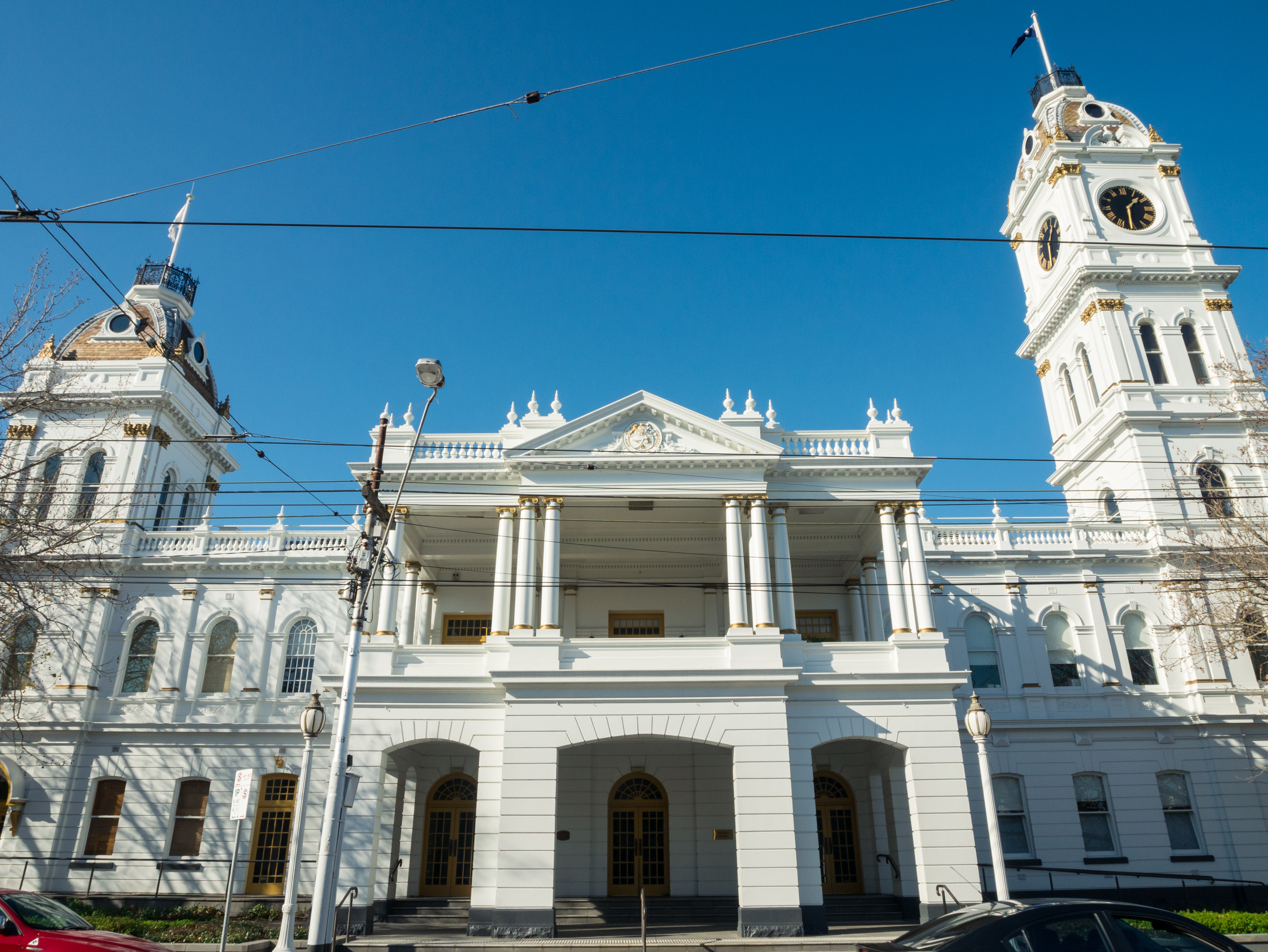Iconic white courthouse with clock tower in Malvern, Melbourne, maintained with electrical expertise from Approved Electrix, your local electrician Malvern Melbourne specialists.