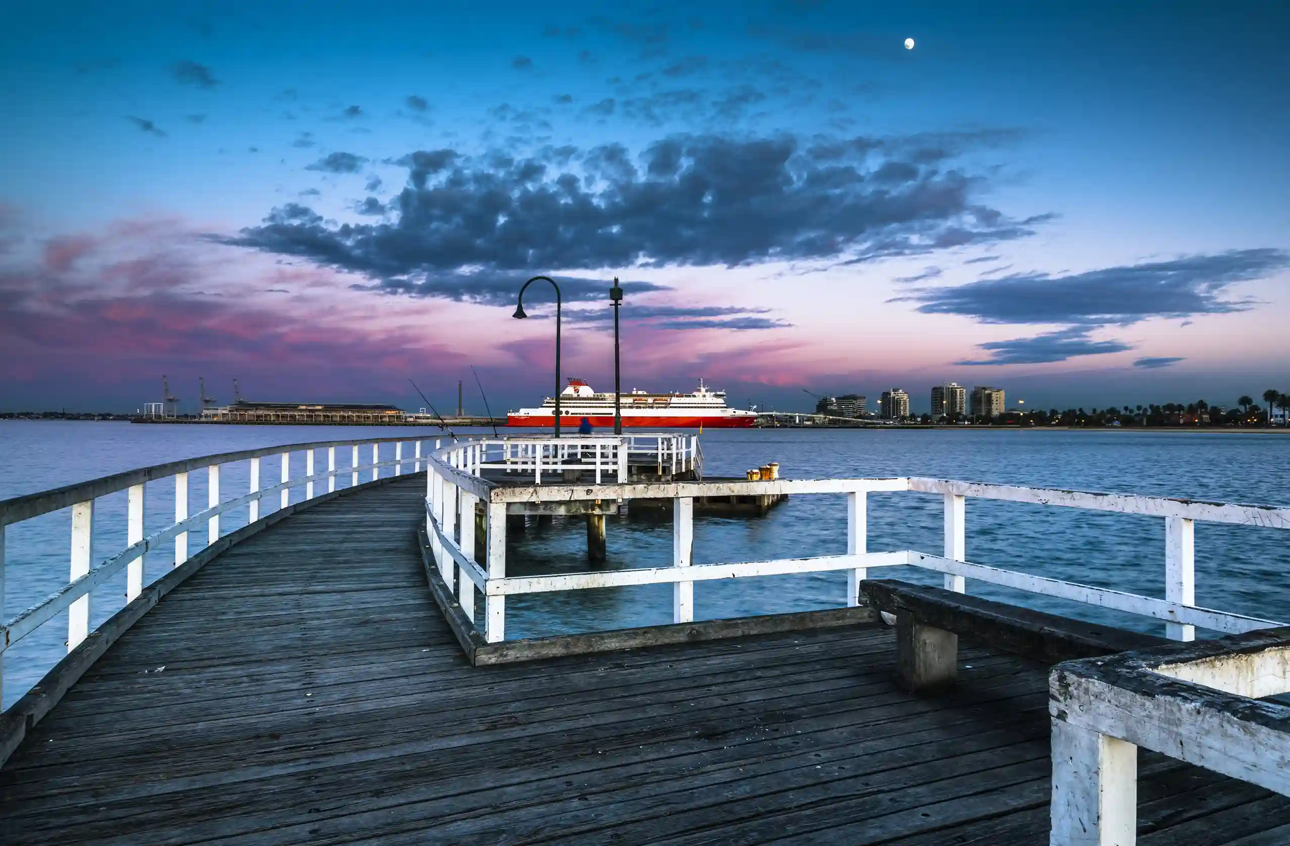 Sunset at Port Melbourne with a view of the pier and a ferry
