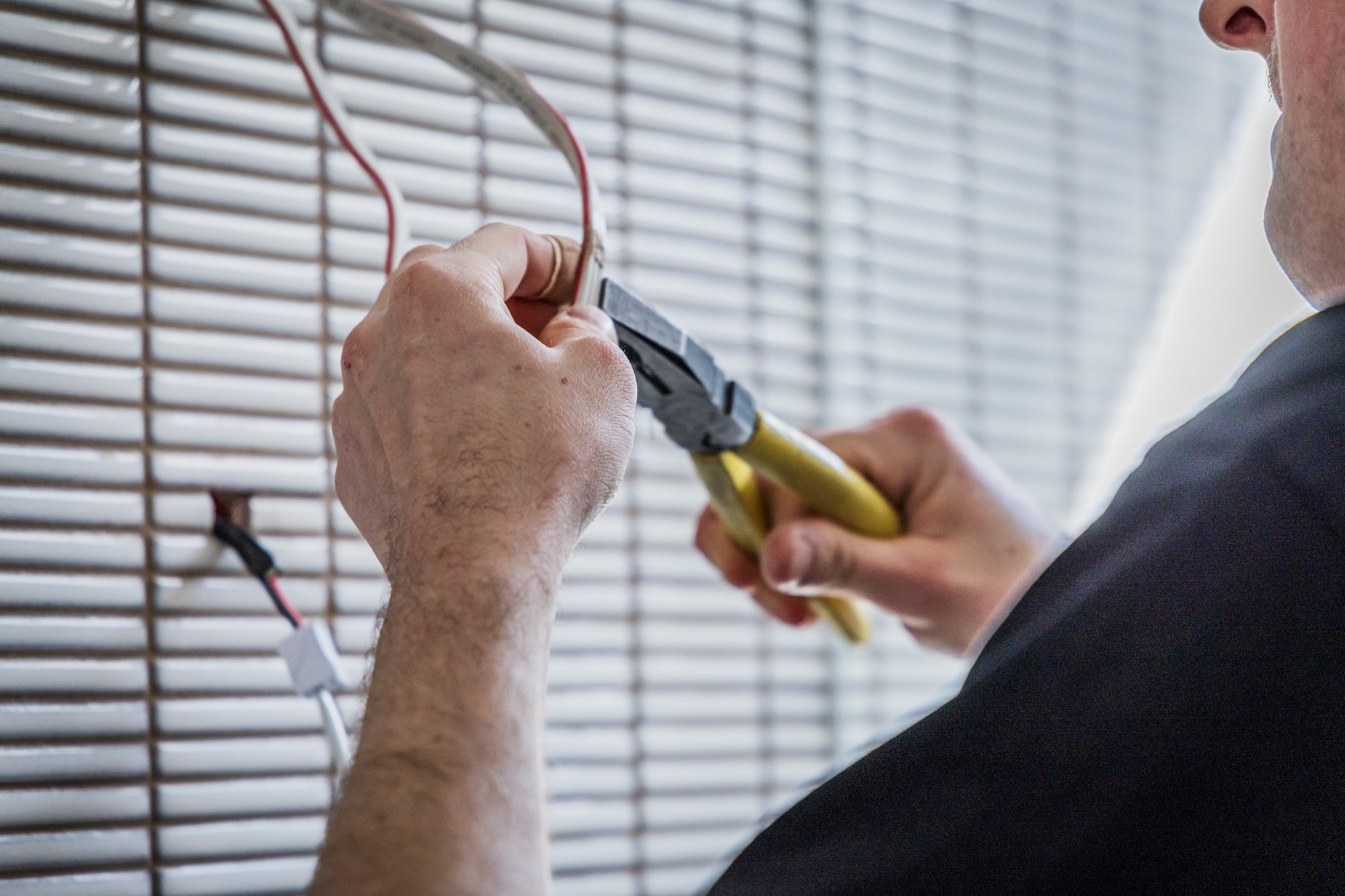 Electrician preparing cables