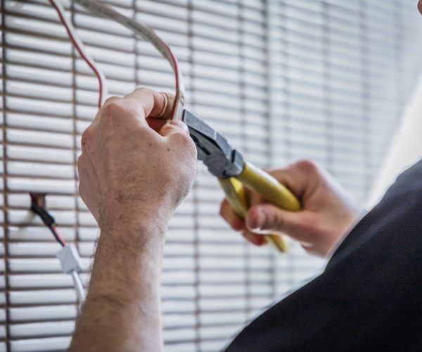Electrician preparing cables