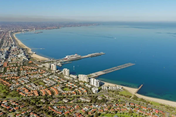 Aerial view of Port Melbourne showing dense residential areas and the expansive coastline